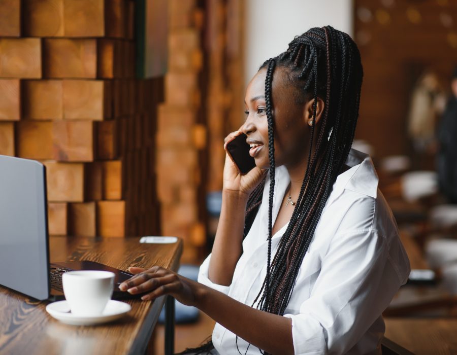 Professional African american copywriter talking about new project